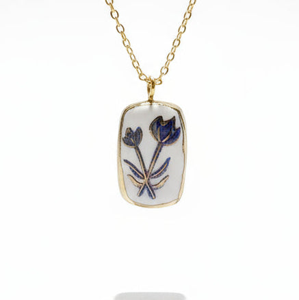 Pendentif fleur bleue et dorée Talis&co