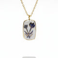 Pendentif fleur bleue et dorée Talis&co