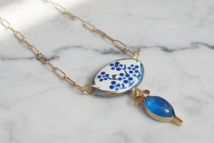 Collier Artisanal en Acier Inoxydable – Pendentifs Argile Polymère & Résine Époxy