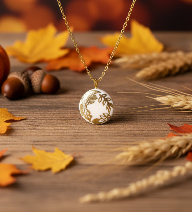 Pendentif couronne de feuilles dorées Talis&co