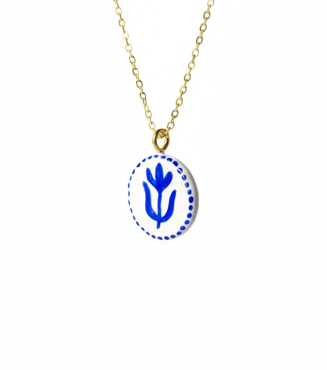Pendentif bleu et blanc motif fleur Talis&co | Argile polymère