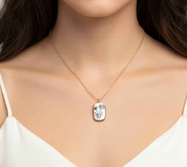 Pendentif bleu et doré fleur Talis&co -Argile polymère 