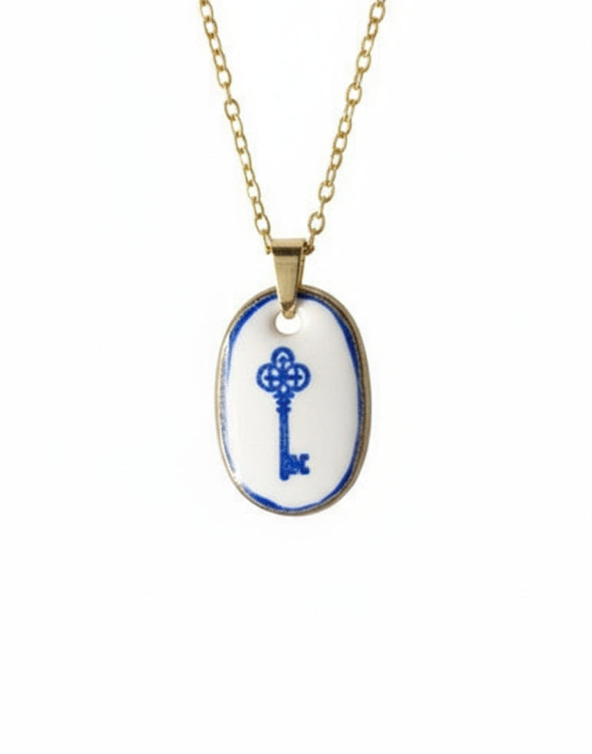  Pendentif bleu et doré clé Talis&co - argile polymère