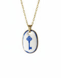 Pendentif clé en argile polymère 