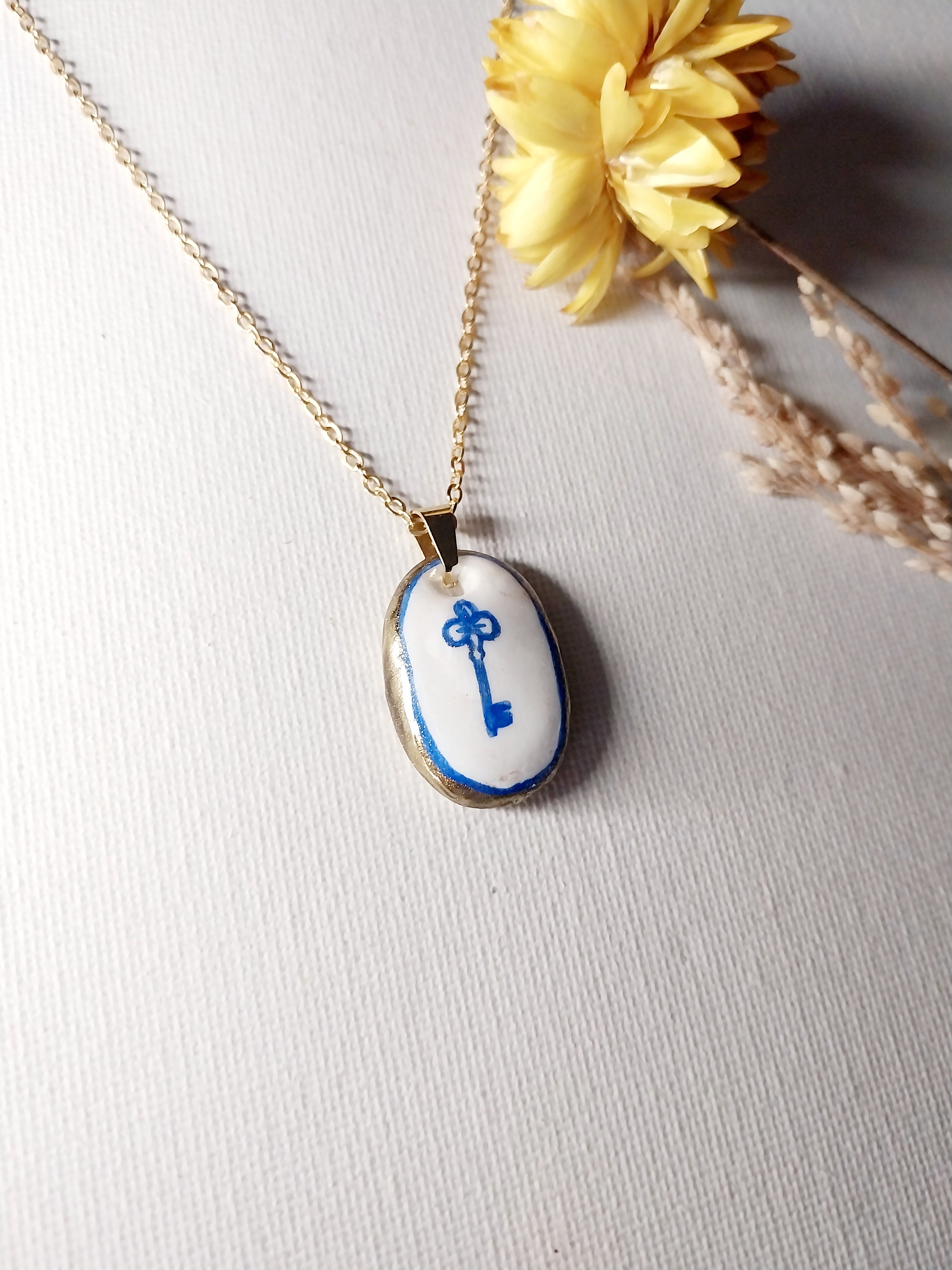 Pendentif clé bleu et doré Talis&co