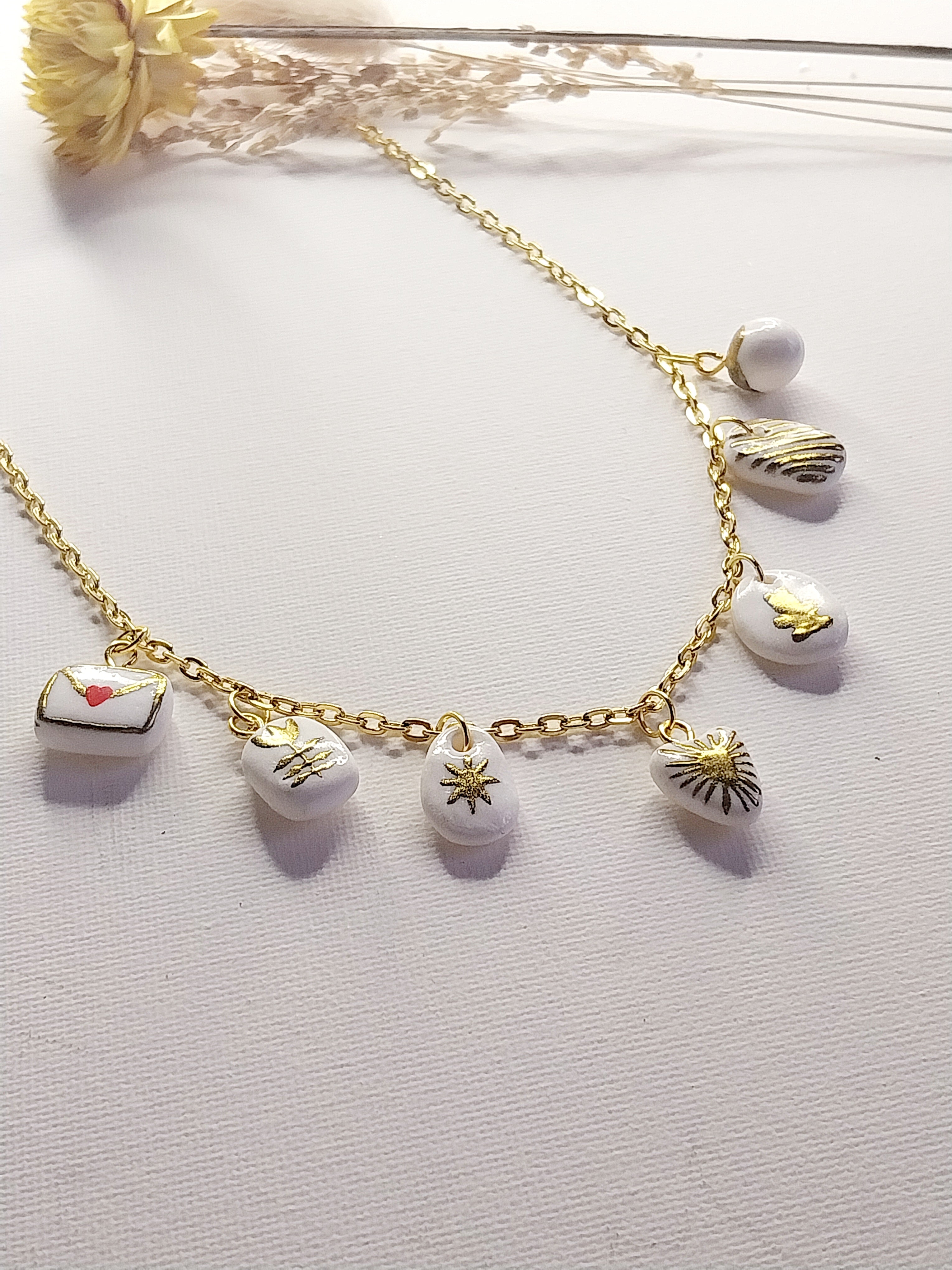 Collier à charmes dorés Talis&co