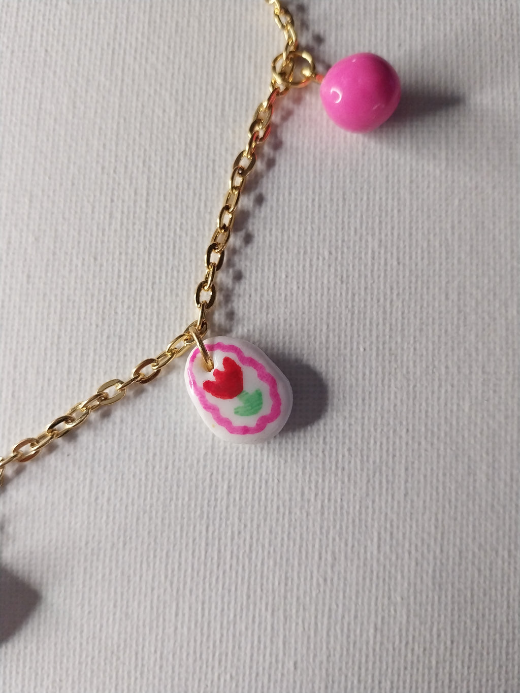 Collier à breloques roses Talis&co