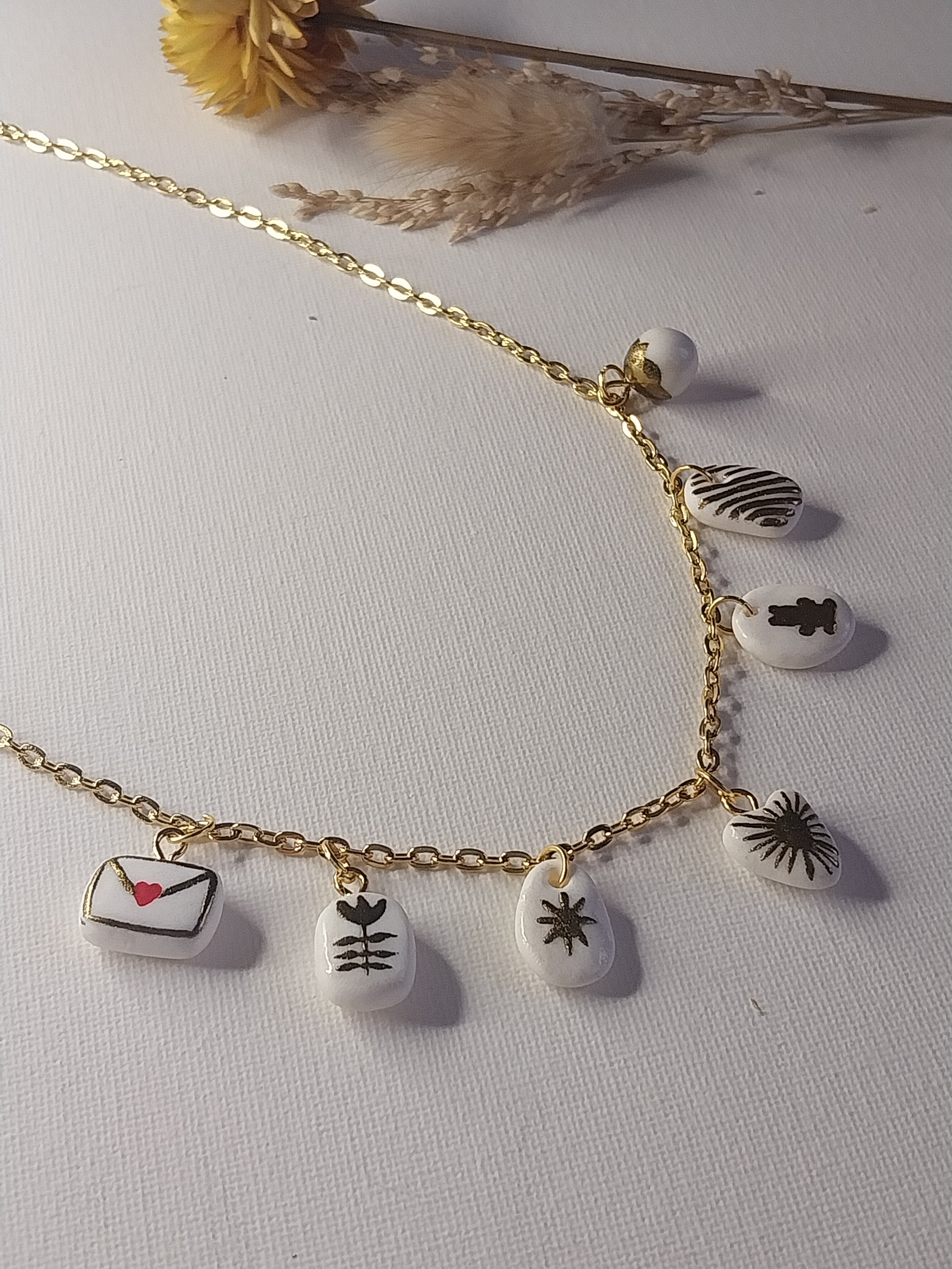 Collier à charmes dorés Talis&co