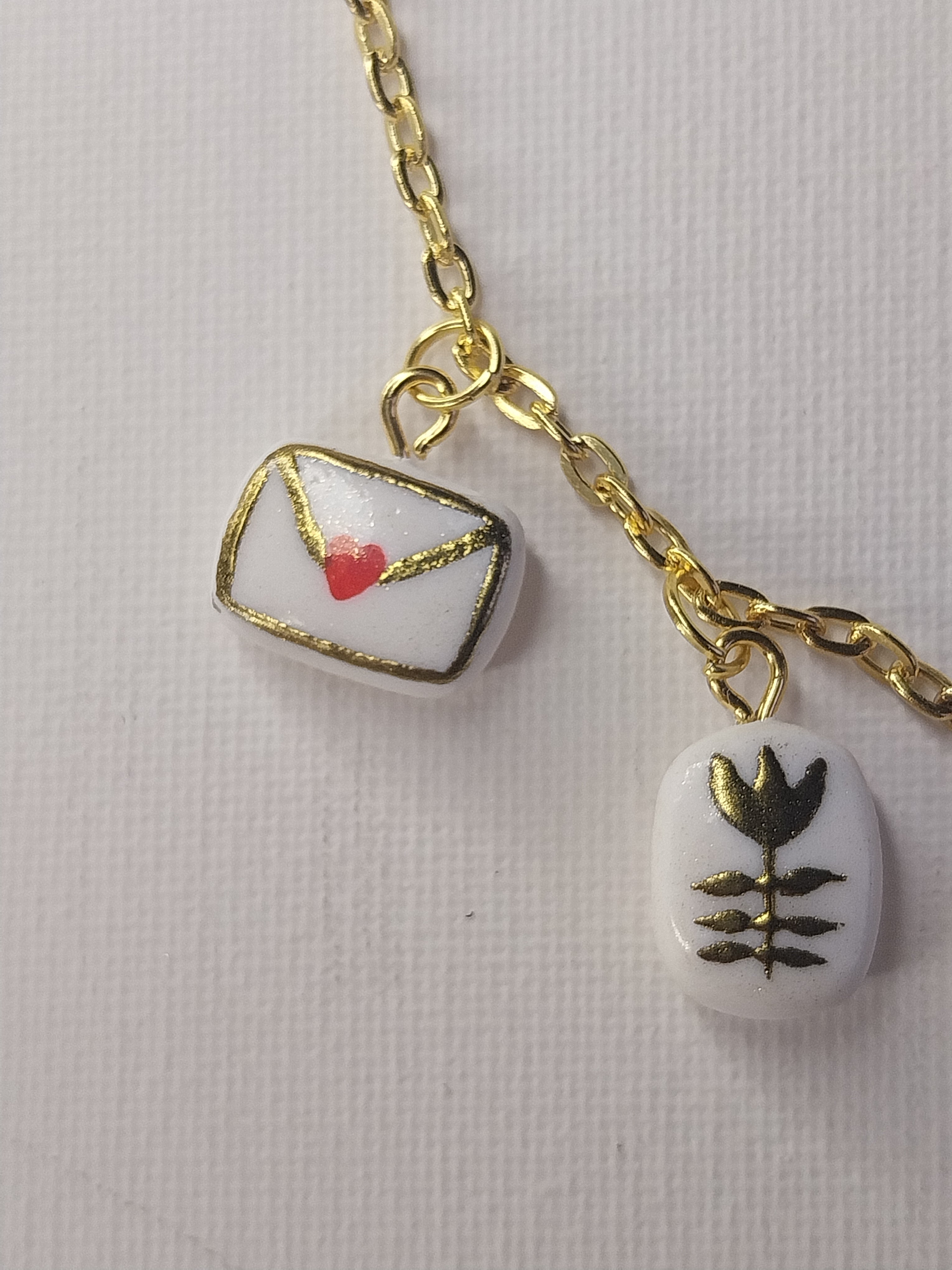 Collier à charmes dorés Talis&co