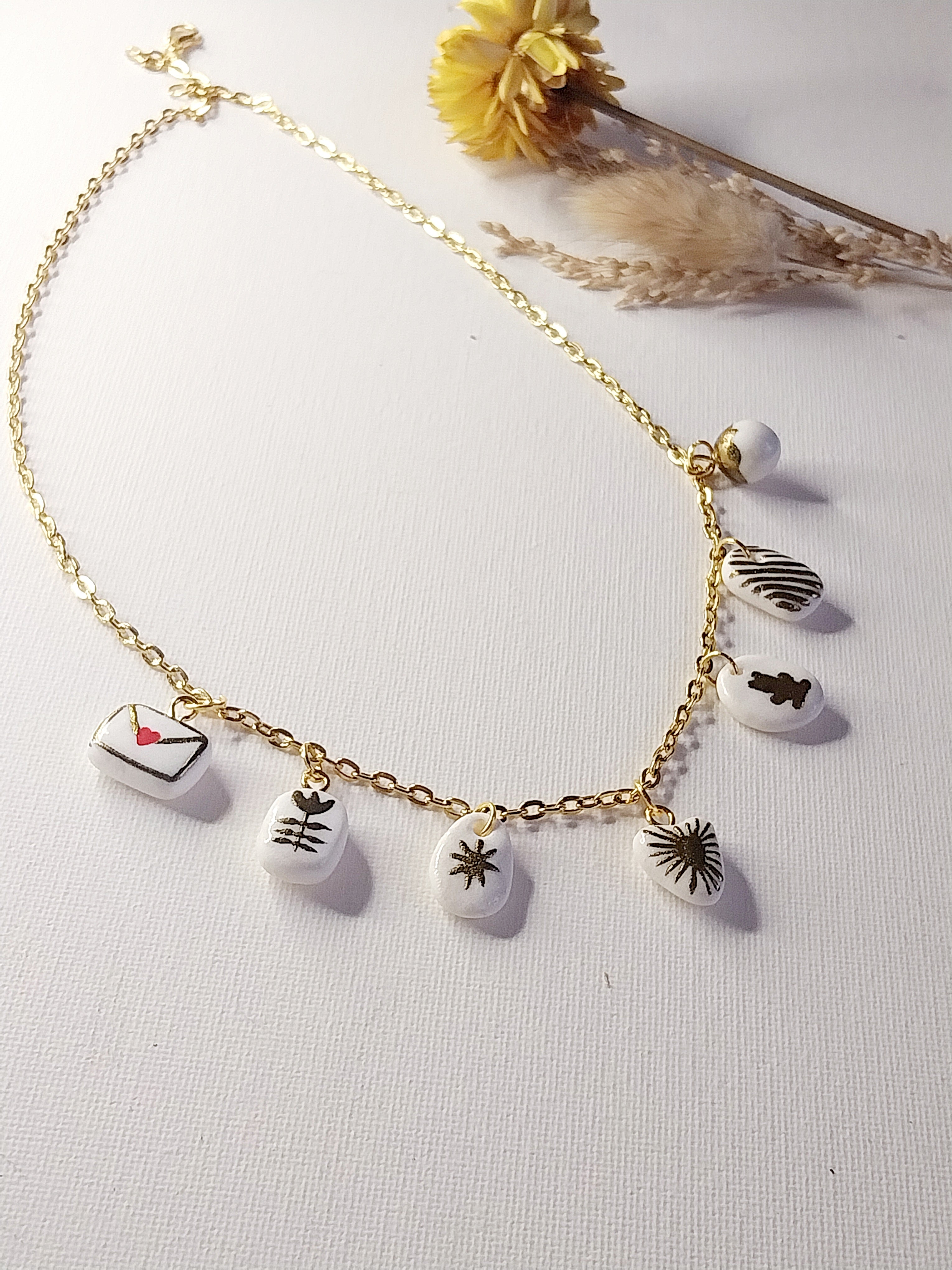 Collier à charmes dorés Talis&co