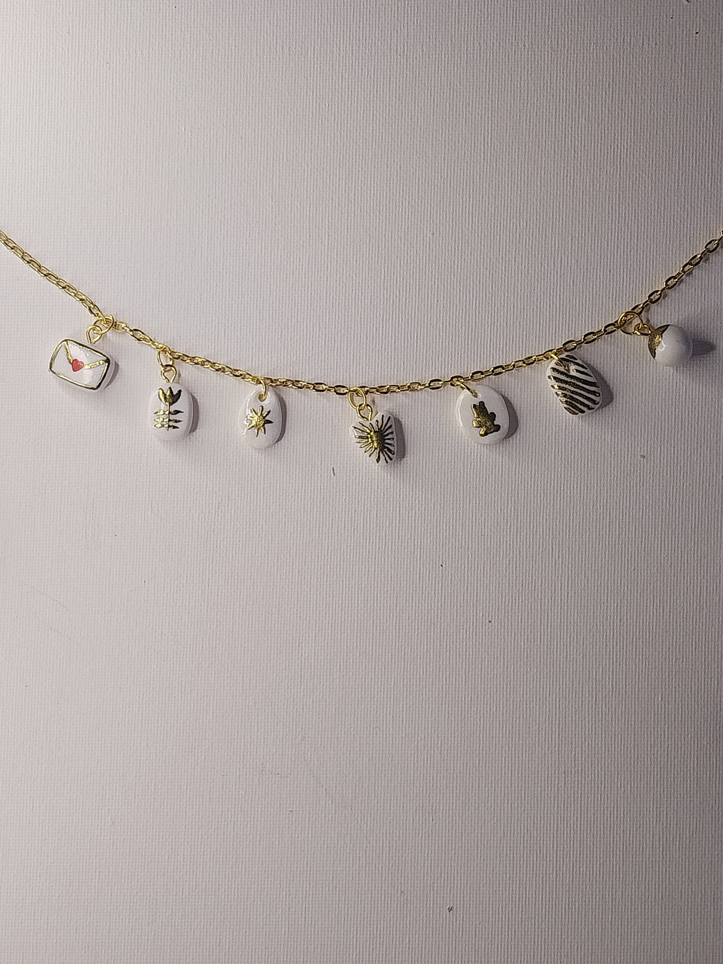 Collier à charmes dorés Talis&co