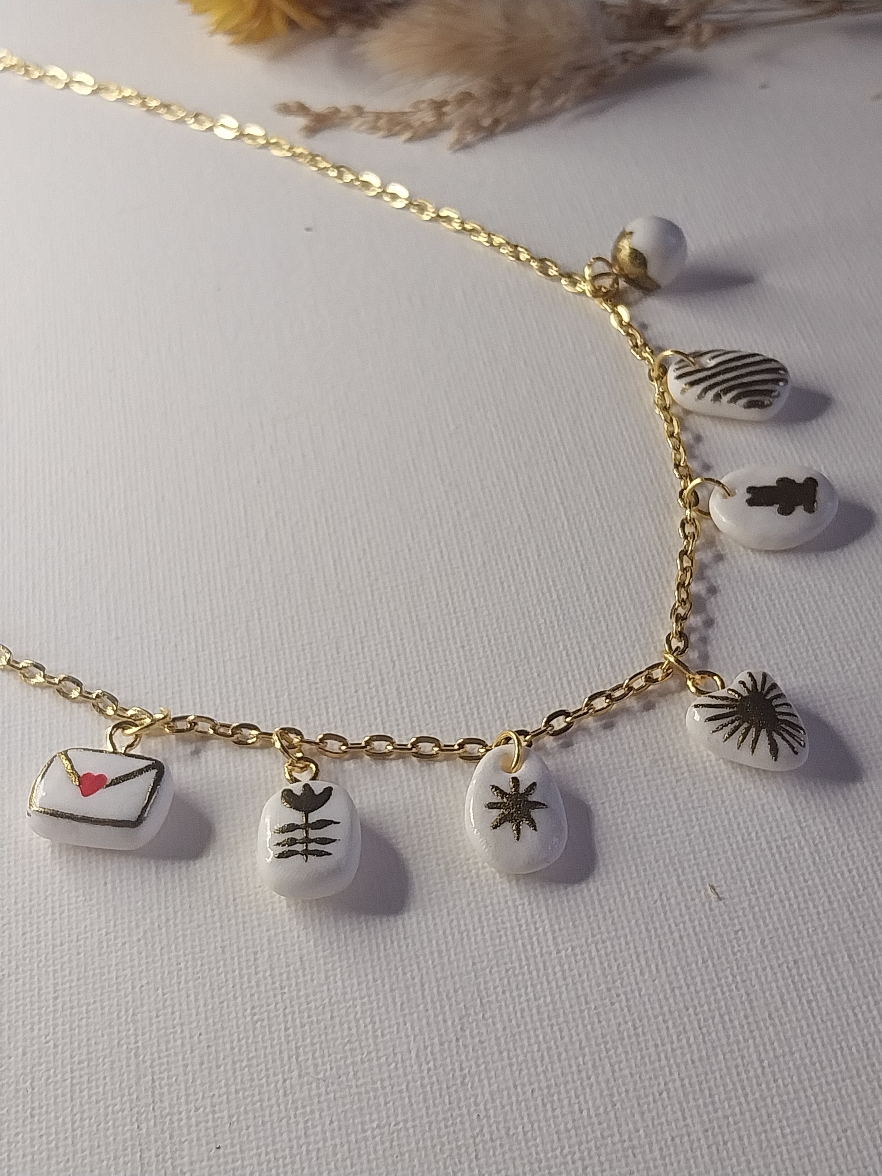 Collier à charmes dorés Talis&co