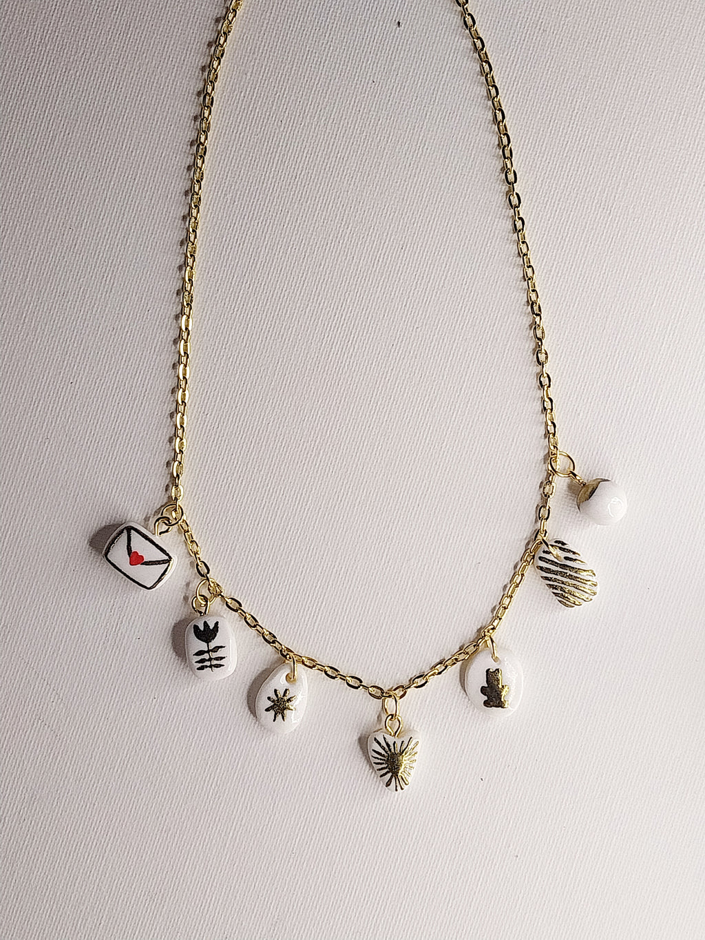 Collier à charmes dorés Talis&co