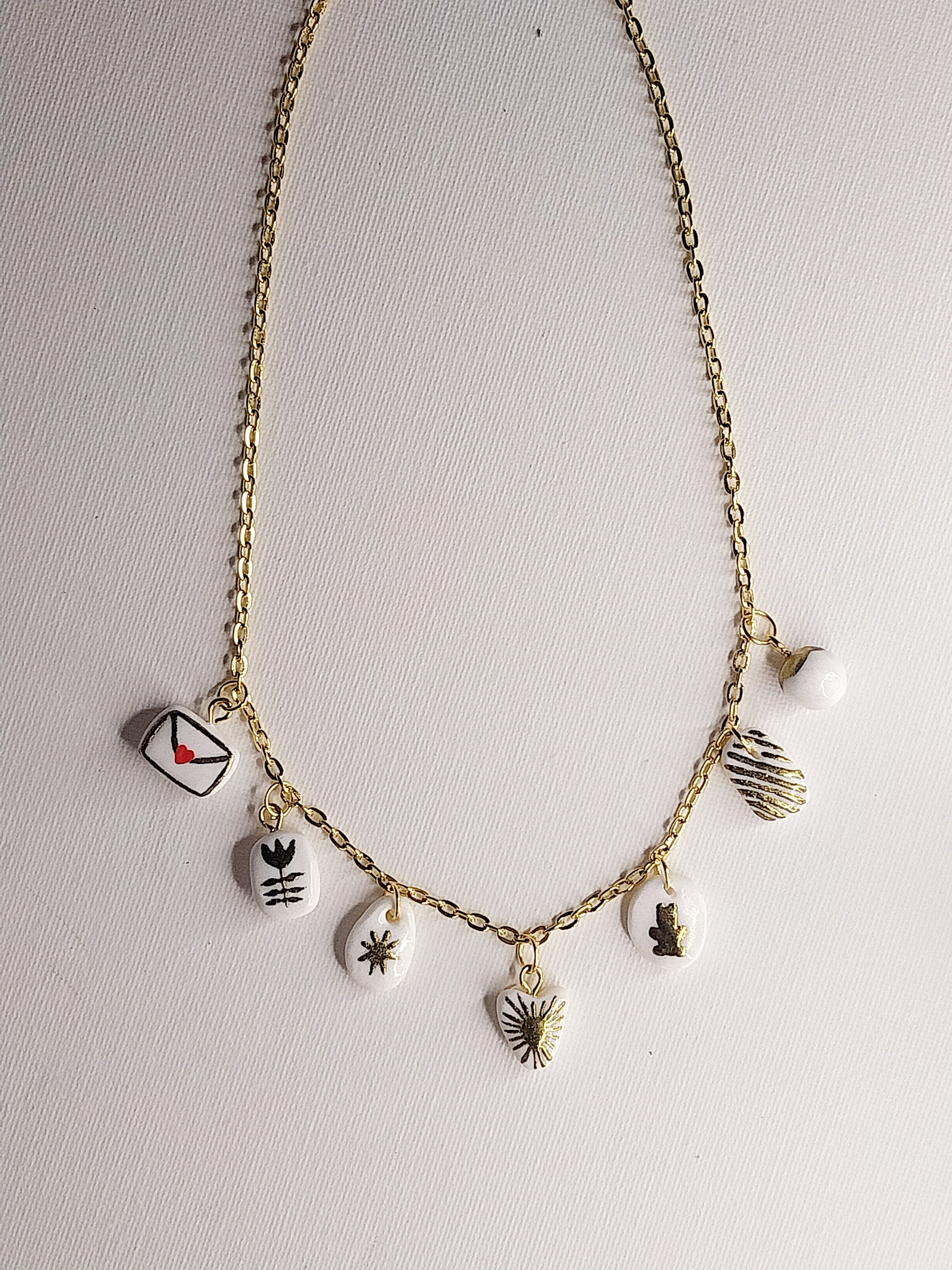 Collier à charmes dorés Talis&co