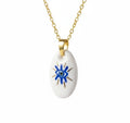 Pendentif Œil protecteur bleu et doré Talis&co